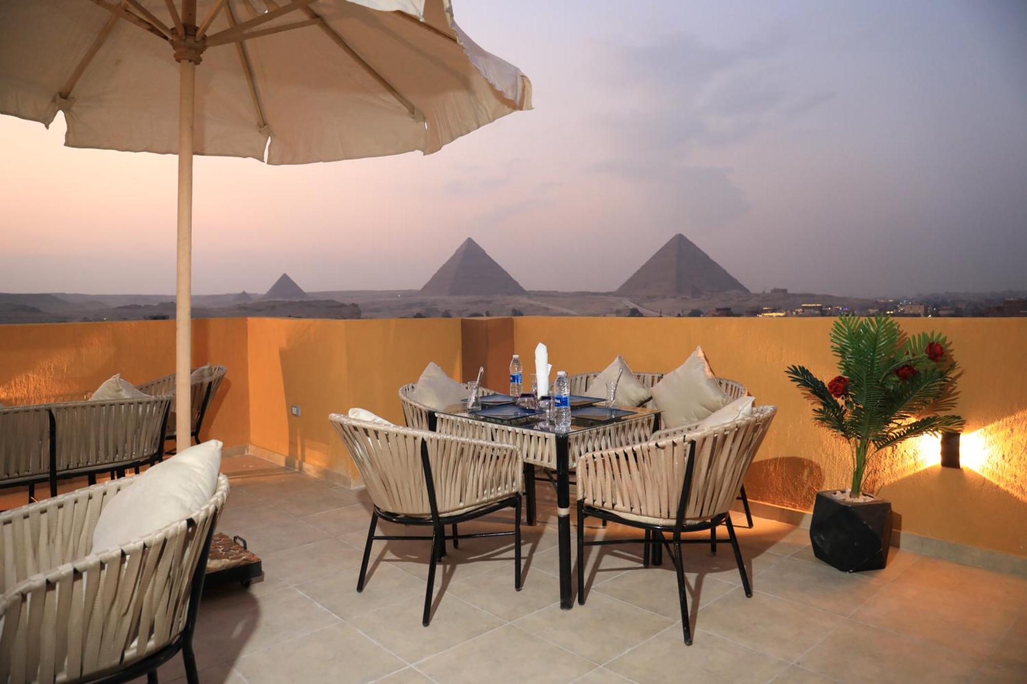 Pyramids Heart Hotel Kafret el-Gabal エクステリア 写真