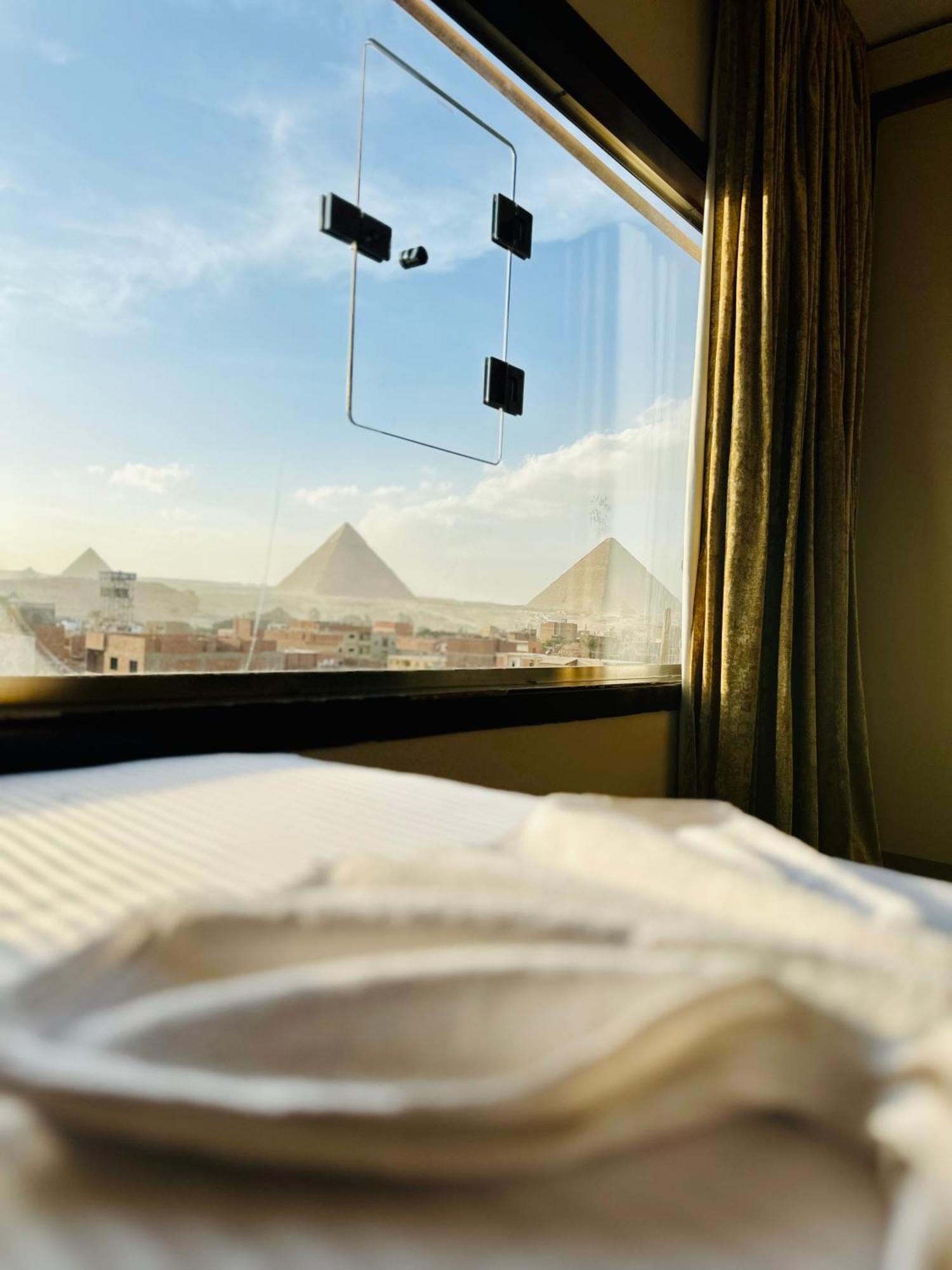 Pyramids Heart Hotel Kafret el-Gabal エクステリア 写真